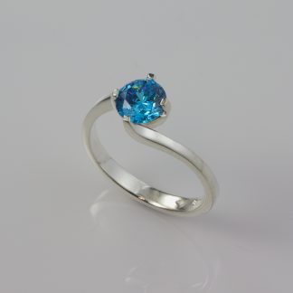 Stg Crossover 4 claw CZ Ring 7mm Round Blue_0