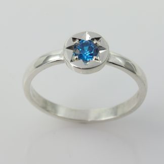 Stg Disc Ring With Star Set Light Blue CZ_0
