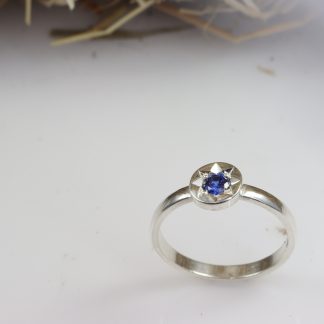 Stg Disc Ring With Star Set Blue CZ_0