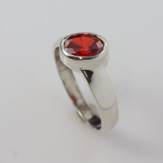 Stg Rub Set Ring 8 x 6 CZ Offf Set Orange_0